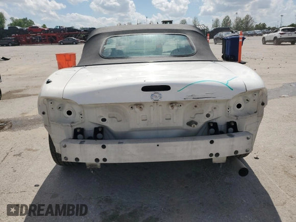 2000 Mazda MX-5 Miata with VIN JM1NB3531Y0152594, listed as a Copart auction lot 57460195 with 78,139 mi miles and Salvage title. Bid and sale history available at DreamBid. Image 6.