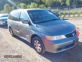 2002 Honda Odyssey EX z VIN 2HKRL18612H544266, wystawiony jako IAAI lot #40264483 z przebiegiem 209 196 mil mil oraz . Historia ofert i sprzedaży dostępna na DreamBid. Obrazek 1.