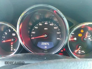 2009 Cadillac CTS AWD w/1SA with VIN 1G6DG577990113457, listed as a IAAI auction lot 38002705 with 101,298 mi miles. Bid and sale history available at carsss.com. Image 7.