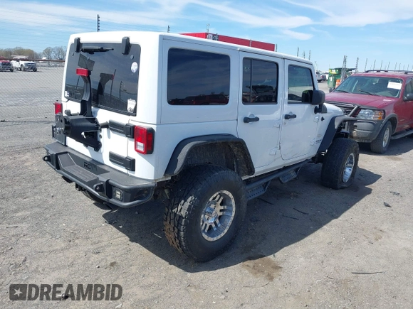2014 Jeep Wrangler Unlimited Sahara with VIN 1C4BJWEG6EL203866, listed as a IAAI auction lot 41846091 with 105,296 mi miles. Bid and sale history available at carsss.com. Image 4.