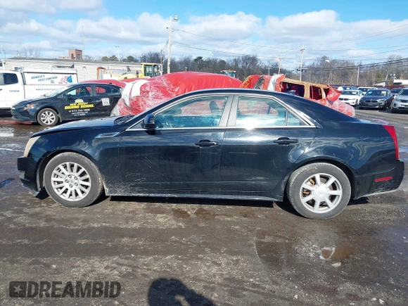 2012 Cadillac CTS with VIN 1G6DC5E5XC0144060, listed as a IAAI auction lot 41596919 with 108,151 mi miles and . Bid and sale history available at DreamBid. Image 14.