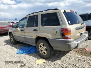 2000 Jeep Grand Cherokee Laredo with VIN 1J4GW48S6YC304447, listed as a Copart auction lot 58001035 with Not provided miles and Clean title. Bid and sale history available at DreamBid. Image 2.