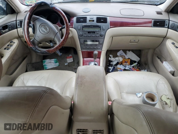 2003 Lexus ES 300 with VIN JTHBF30G036009951, listed as a Copart auction lot 50021235 with 231,411 mi miles and Salvage Title. Bid and sale history available at DreamBid. Image 8.