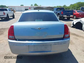 2006 Chrysler 300 Touring with VIN 2C3KA53G56H324954, listed as a IAAI auction lot 42058478 with 124,933 mi miles. Bid and sale history available at carsss.com. Image 16.