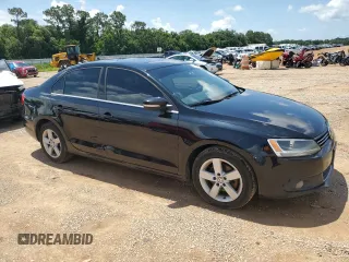 2012 Volkswagen Jetta TDI w/Premium & Nav with VIN 3VWLL7AJ7CM367139, listed as a Copart auction lot 60587835 with 238,919 mi miles and Clean title. Bid and sale history available at DreamBid. Image 4.