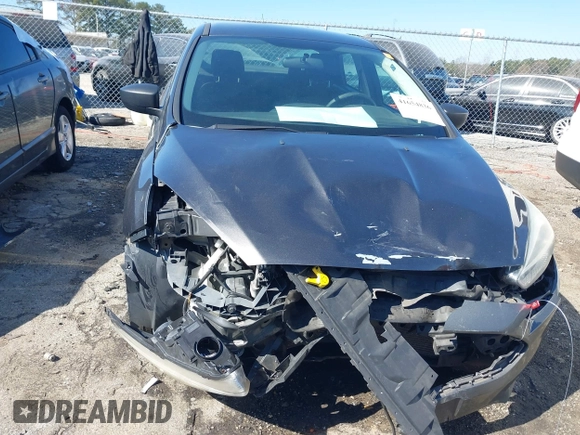 2017 Ford Focus S z VIN 1FADP3E29HL269607, wystawiony jako IAAI lot #41654836 z przebiegiem 101 645 mil mil oraz . Historia ofert i sprzedaży dostępna na DreamBid. Obrazek 6.