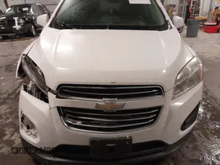 2015 Chevrolet Trax LT with VIN 3GNCJRSB7FL203418, listed as a IAAI auction lot 41572289 with 148,402 mi miles and . Bid and sale history available at DreamBid. Image 12.