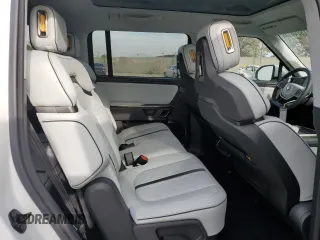 2024 Rivian R1S Adventure z VIN 7PDSGABA4RN043975, wystawiony jako Copart lot #41524615 z przebiegiem 6 807 mil mil oraz Szkoda całkowita • Salvage title. Historia ofert i sprzedaży dostępna na DreamBid. Obrazek 12.