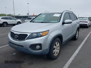 2012 Kia Sorento LX with VIN 5XYKTDA60CG296159, listed as a IAAI auction lot 42197638 with 198,676 mi miles and . Bid and sale history available at carsss.com. Image 2.