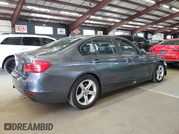 2014 BMW 3 Series 320i xDrive with VIN WBA3C3C53EF985375, listed as a Copart auction lot 62833435 with 75,726 mi miles and Salvage title. Bid and sale history available at DreamBid. Image 3.