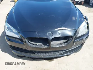 2013 BMW 6 Series 650i with VIN WBAYM9C57DDW20178, listed as a IAAI auction lot 41933561 with 72,886 mi miles and . Bid and sale history available at carsss.com. Image 6.