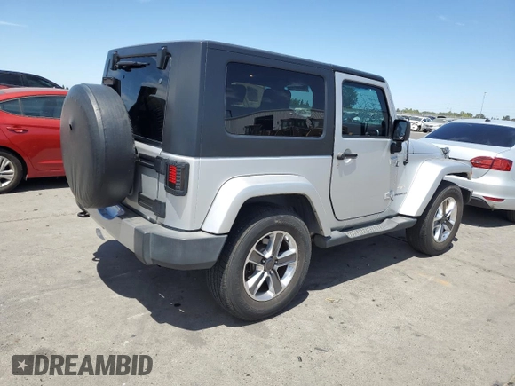 2009 Jeep Wrangler Sahara with VIN 1J4FA54149L708183, listed as a Copart auction lot 65989125 with 133,436 mi miles and Salvage title. Bid and sale history available at DreamBid. Image 3.