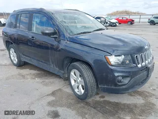 2015 Jeep Compass Sport with VIN 1C4NJDBBXFD151700, listed as a IAAI auction lot 41855482 with 124,822 mi miles. Bid and sale history available at carsss.com. Image 1.