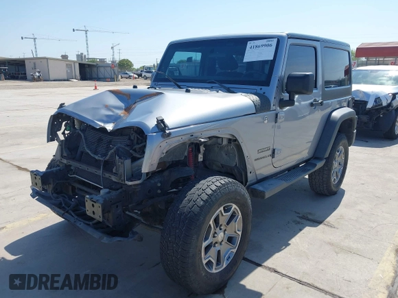 2014 Jeep Wrangler Sport with VIN 1C4AJWAG9EL155409, listed as a IAAI auction lot 41869906 with 102,400 mi miles and . Bid and sale history available at carsss.com. Image 2.