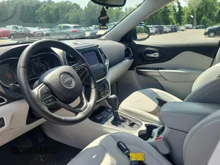 2021 Jeep Cherokee Altitude with VIN 1C4PJMLB9MD211826, listed as a IAAI auction lot 42666661 with 47,838 mi miles and . Bid and sale history available at DreamBid. Image 9.