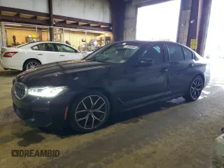 2022 BMW 5 Series 540i xDrive with VIN WBA73BJ01NWX58415, listed as a Copart auction lot 48694395 with 27,945 mi miles and Salvage title. Bid and sale history available at DreamBid. Image 1.