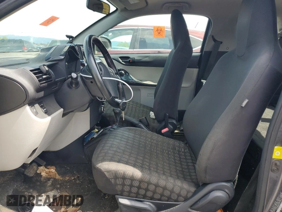 2012 Scion iQ z VIN JTNJJXB05CJ012193, wystawiony jako Copart lot #52180495 z przebiegiem Nie podano mil oraz Szkoda całkowita • Salvage title. Historia ofert i sprzedaży dostępna na DreamBid. Obrazek 7.