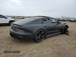 2021 Audi RS 7 z VIN WUAPCBF28MN901560, wystawiony jako Copart lot #84767714 z przebiegiem Nie podano mil oraz Szkoda całkowita • Salvage title. Historia ofert i sprzedaży dostępna na DreamBid. Obrazek 3.