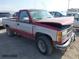 1992 Chevrolet C/K 1500 with VIN 1GCEK14K7NE106585, listed as a IAAI auction lot 40571156 with 148,563 mi miles. Bid and sale history available at carsss.com. Image 1.