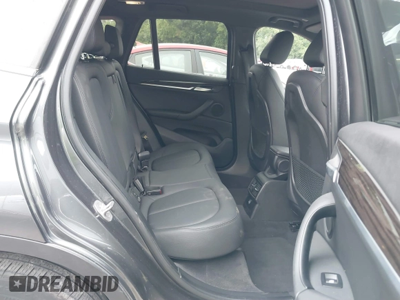 2017 BMW X1 xDrive28i with VIN WBXHT3C38H5F84508, listed as a IAAI auction lot 40035344 with 43,321 mi miles and . Bid and sale history available at DreamBid. Image 8.