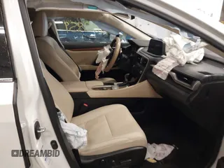 2021 Lexus RX with VIN 2T2HGMDA6MC064446, listed as a IAAI auction lot 41108859 with 116,930 mi miles. Bid and sale history available at carsss.com. Image 5.