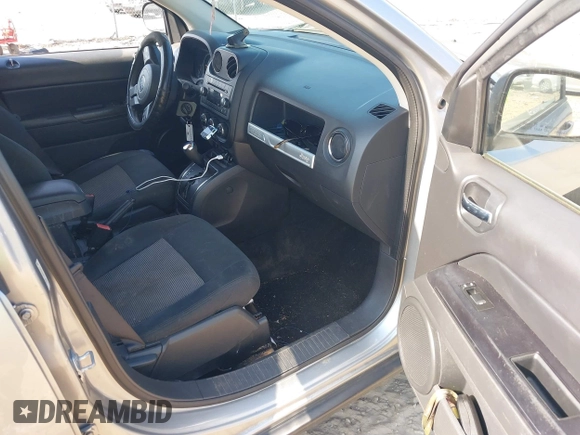 2015 Jeep Compass Sport with VIN 1C4NJCBB5FD110725, listed as a IAAI auction lot 40506090 with 132,207 mi miles. Bid and sale history available at carsss.com. Image 5.