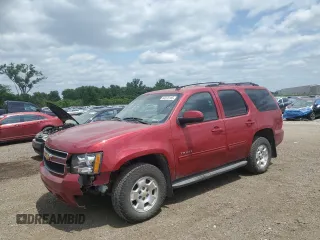 2012 Chevrolet Tahoe LT with VIN 1GNSKBE06CR324181, listed as a Copart auction lot 60070185 with 311,076 mi miles and Salvage title. Bid and sale history available at DreamBid. Image 1.