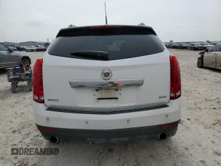 2014 Cadillac SRX Performance Collection with VIN 3GYFNCE34ES659404, listed as a Copart auction lot 54991955 with 169,308 mi miles and Clean title. Bid and sale history available at DreamBid. Image 6.