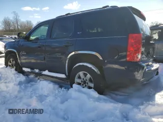2009 GMC Yukon SLT w/4SB with VIN 1GKFK33059R146280, listed as a Copart auction lot 87421444 with 118,566 mi miles and Salvage Title. Bid and sale history available at carsss.com. Image 2.