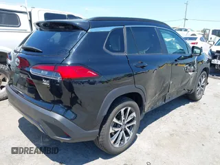 2022 Toyota Corolla Cross XLE with VIN 7MUEAABG3NV042742, listed as a IAAI auction lot 42595052 with 54,299 mi miles and . Bid and sale history available at DreamBid. Image 4.