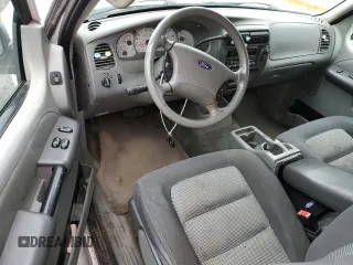 2003 Ford Explorer Sport XLS with VIN 1FMYU60E63UA24544, listed as a Copart auction lot 53888765 with 263,249 mi miles and Salvage title. Bid and sale history available at DreamBid. Image 8.