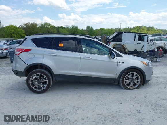 2016 Ford Escape SE with VIN 1FMCU9G92GUC28879, listed as a IAAI auction lot 42021065 with 99,184 mi miles. Bid and sale history available at carsss.com. Image 13.