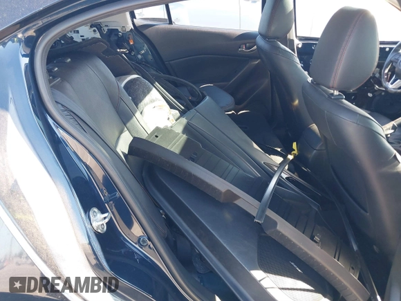 2014 Mazda 3 S Grand Touring with VIN JM1BM1M32E1208762, listed as a IAAI auction lot 41814130 with 117,620 mi miles and . Bid and sale history available at DreamBid. Image 8.