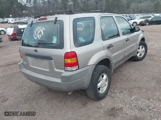 2001 Ford Escape XLS with VIN 1FMYU01141KA46852, listed as a IAAI auction lot 41616606 with 225,752 mi miles. Bid and sale history available at carsss.com. Image 4.