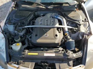 2005 Nissan 350Z Touring z VIN JN1AZ36A95M751810, wystawiony jako Copart lot #55104085 z przebiegiem 99 278 mil mil oraz Szkoda całkowita • Salvage title. Historia ofert i sprzedaży dostępna na DreamBid. Obrazek 11.