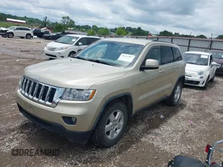 2011 Jeep Grand Cherokee Laredo with VIN 1J4RR4GG8BC558018, listed as a IAAI auction lot 42347367 with 180,334 mi miles and . Bid and sale history available at DreamBid. Image 2.