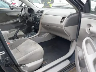 2009 Toyota Corolla with VIN 1NXBU40E49Z165082, listed as a IAAI auction lot 41881134 with 261,282 mi miles. Bid and sale history available at carsss.com. Image 5.