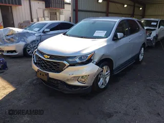 2019 Chevrolet Equinox LT z VIN 2GNAXKEV1K6189548, wystawiony jako IAAI lot #42315123 z przebiegiem 51 799 mil mil oraz . Historia ofert i sprzedaży dostępna na DreamBid. Obrazek 2.
