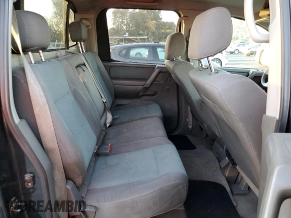 2005 Nissan Titan SE with VIN 1N6AA07A55N557591, listed as a Copart auction lot 85991164 with 176,809 mi miles and Salvage Title. Bid and sale history available at DreamBid. Image 10.