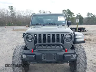 2021 Jeep Gladiator Rubicon with VIN 1C6JJTBG7ML554354, listed as a IAAI auction lot 41796943 with 61,513 mi miles and . Bid and sale history available at DreamBid. Image 13.