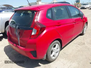 2017 Honda Fit LX with VIN JHMGK5H5XHS021684, listed as a IAAI auction lot 42044811 with 65,000 mi miles. Bid and sale history available at carsss.com. Image 4.