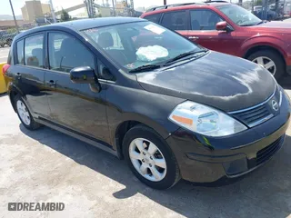 2008 Nissan Versa 1.8 S with VIN 3N1BC13E28L452563, listed as a IAAI auction lot 42118357 with 164,290 mi miles. Bid and sale history available at carsss.com. Image 1.
