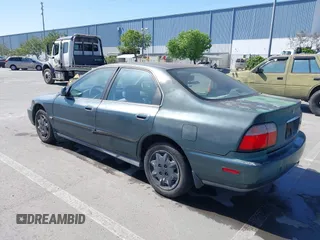 1997 Honda Accord LX with VIN 1HGCD5637VA212185, listed as a IAAI auction lot 42093376 with 239,668 mi miles and . Bid and sale history available at carsss.com. Image 3.