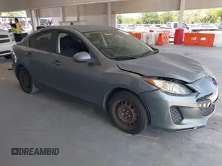 2012 Mazda 3 i Sport z VIN JM1BL1UF8C1521096, wystawiony jako IAAI lot #42324292 z przebiegiem 178 289 mil mil oraz . Historia ofert i sprzedaży dostępna na DreamBid. Obrazek 1.