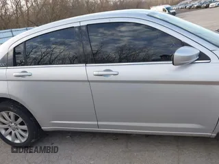 2012 Chrysler 200 Touring with VIN 1C3CCBBB8CN210825, listed as a IAAI auction lot 41828224 with 129,966 mi miles. Bid and sale history available at carsss.com. Image 13.