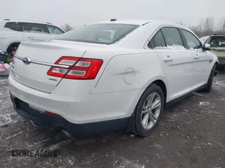 2015 Ford Taurus SEL with VIN 1FAHP2E85FG152256, listed as a IAAI auction lot 41971204 with 120,102 mi miles and . Bid and sale history available at carsss.com. Image 4.