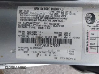 2012 Ford Fusion S with VIN 3FAHP0GAXCR270957, listed as a IAAI auction lot 42122294 with 230,489 mi miles and . Bid and sale history available at carsss.com. Image 9.