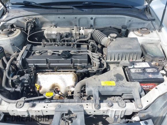 2005 Hyundai Accent GLS with VIN KMHCG35C65U332999, listed as a IAAI auction lot 42097932 with 225,593 mi miles. Bid and sale history available at carsss.com. Image 10.