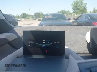 2015 BMW i3 with VIN WBY1Z4C5XFV503375, listed as a IAAI auction lot 42563459 with 38,933 mi miles and . Bid and sale history available at DreamBid. Image 7.