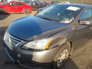 2015 Nissan Sentra SV with VIN 3N1AB7AP6FL645155, listed as a IAAI auction lot 41299721 with 203,064 mi miles and . Bid and sale history available at DreamBid. Image 6.